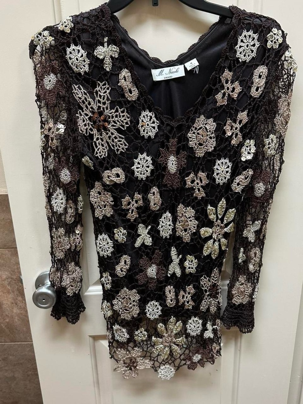 Black and cream crochet lace evening long top/dress with long sleeves.